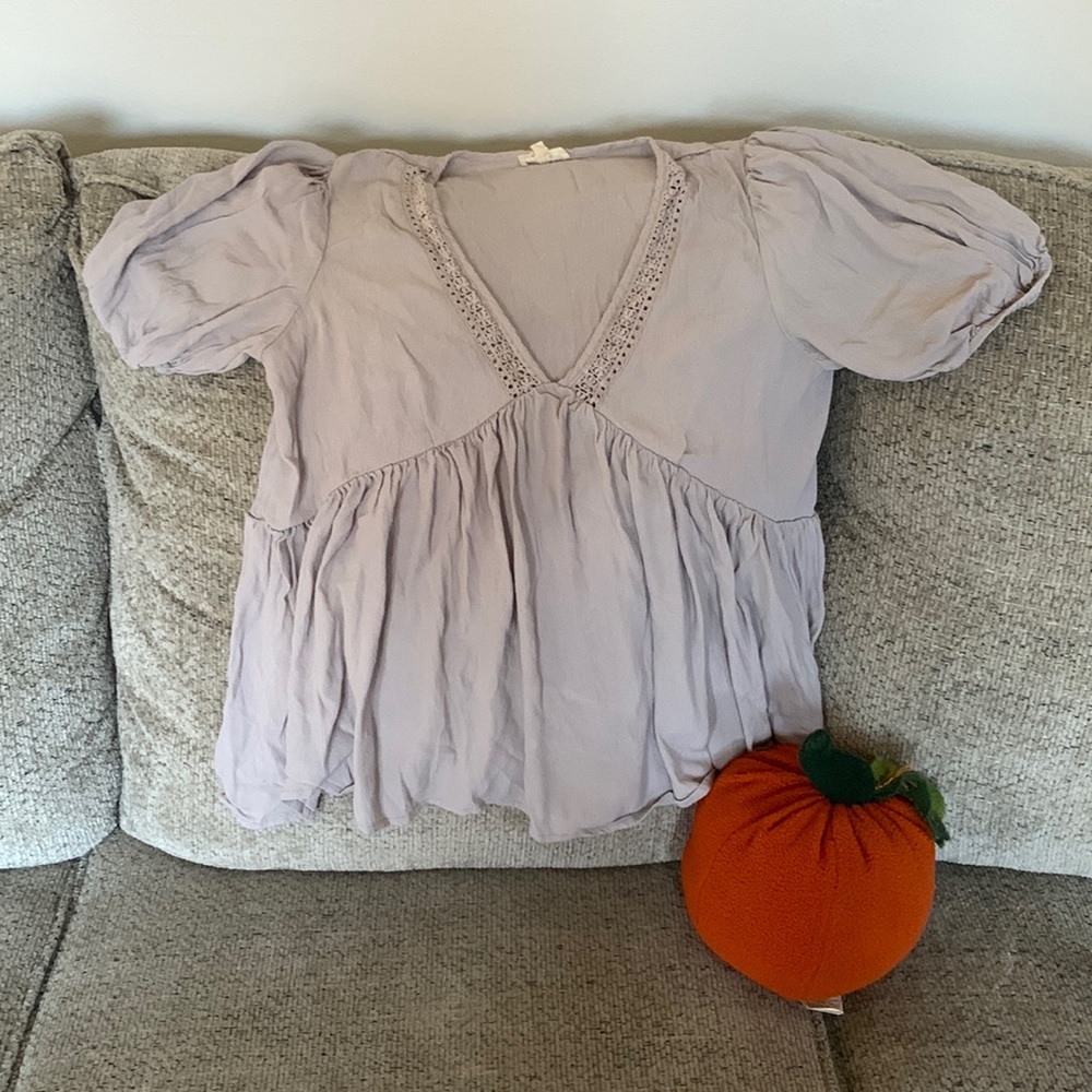 in loom adorable peasant style top.
